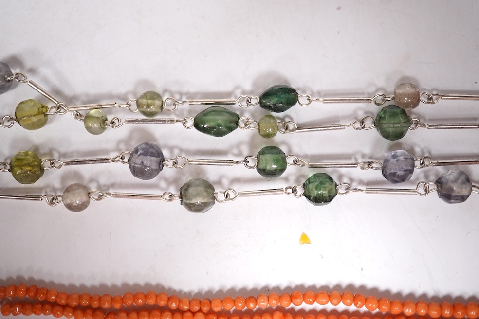 A small quantity of assorted mainly costume jewellery including a pair of malachite earrings and a graduated coral bead necklace, together with an Omega watch box and a gentleman's Quamer quartz wrist watch. Condition -
